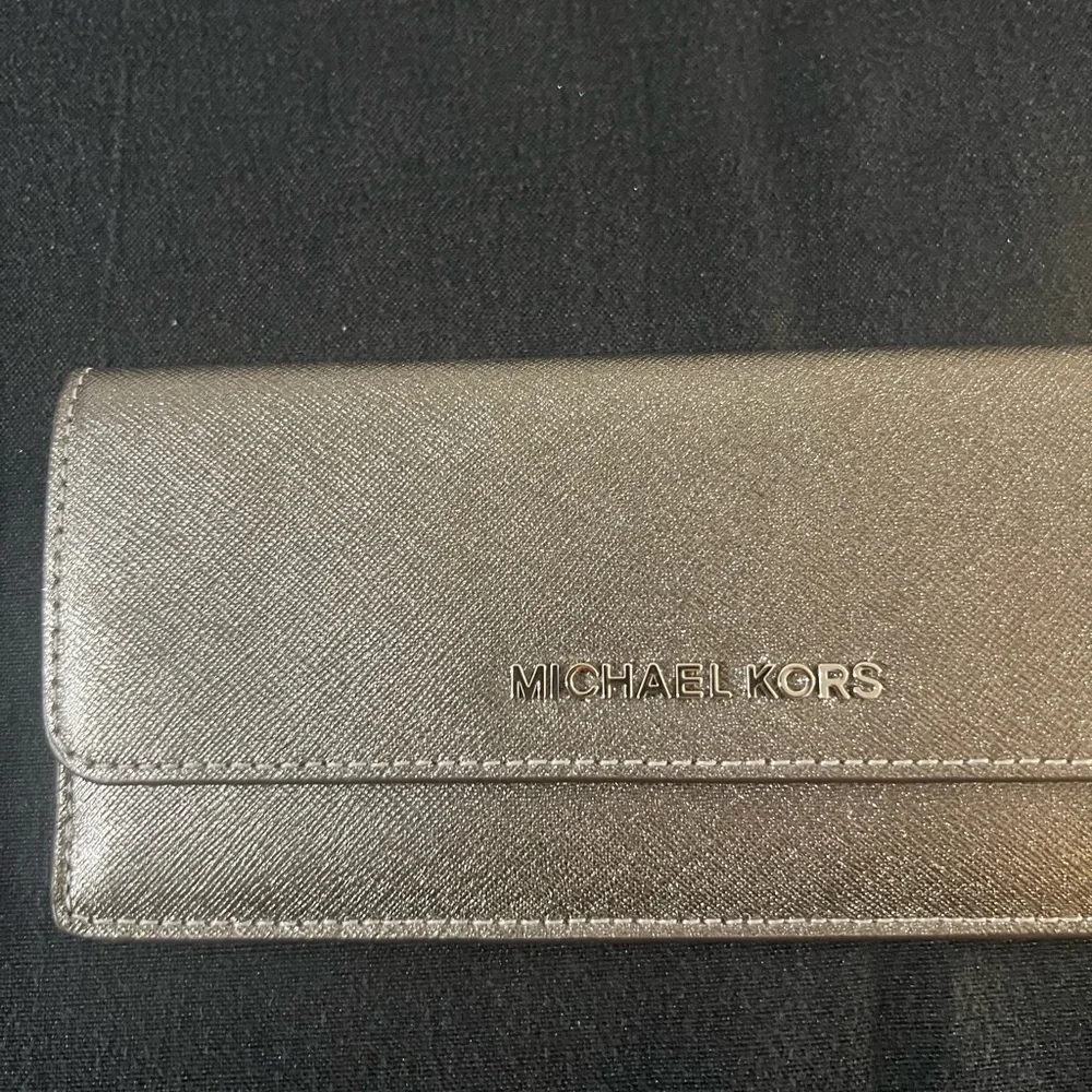 Michael Kors Metallic Silver Clutch - Picture 2 of 11